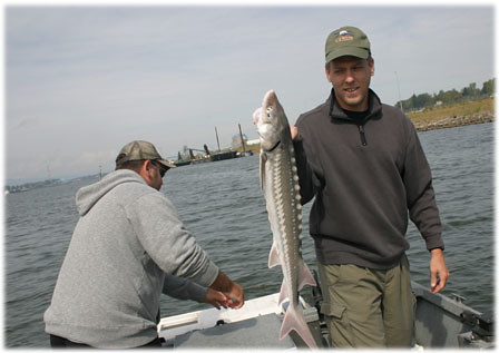 Chris with a sturgeon