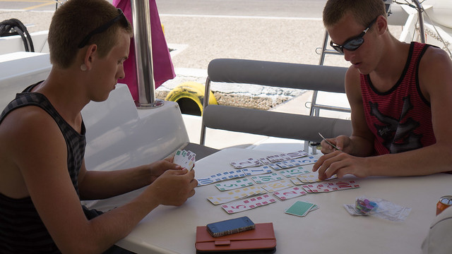 Playing cards on board in Gialos Port on Ios